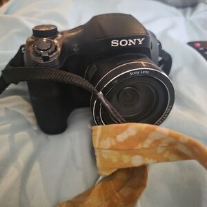 Sony Black Bridge Camera with 35x Lens and Yellow Strap Accent